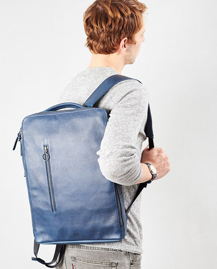 Image of a model with a blue color backpack